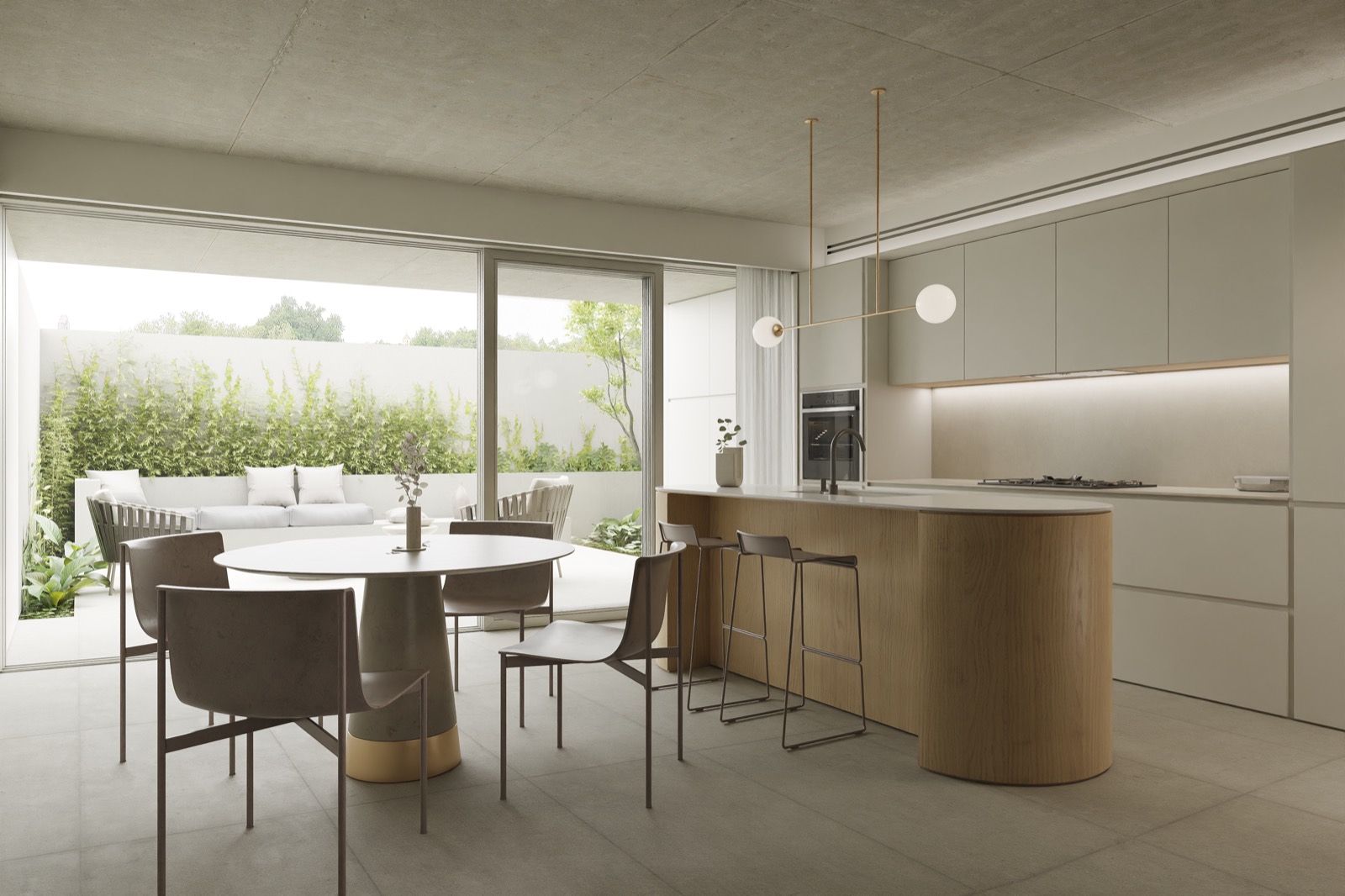 Cocina con isla de roble abierta al comedor y al patio, con cielorraso de hormigón visto